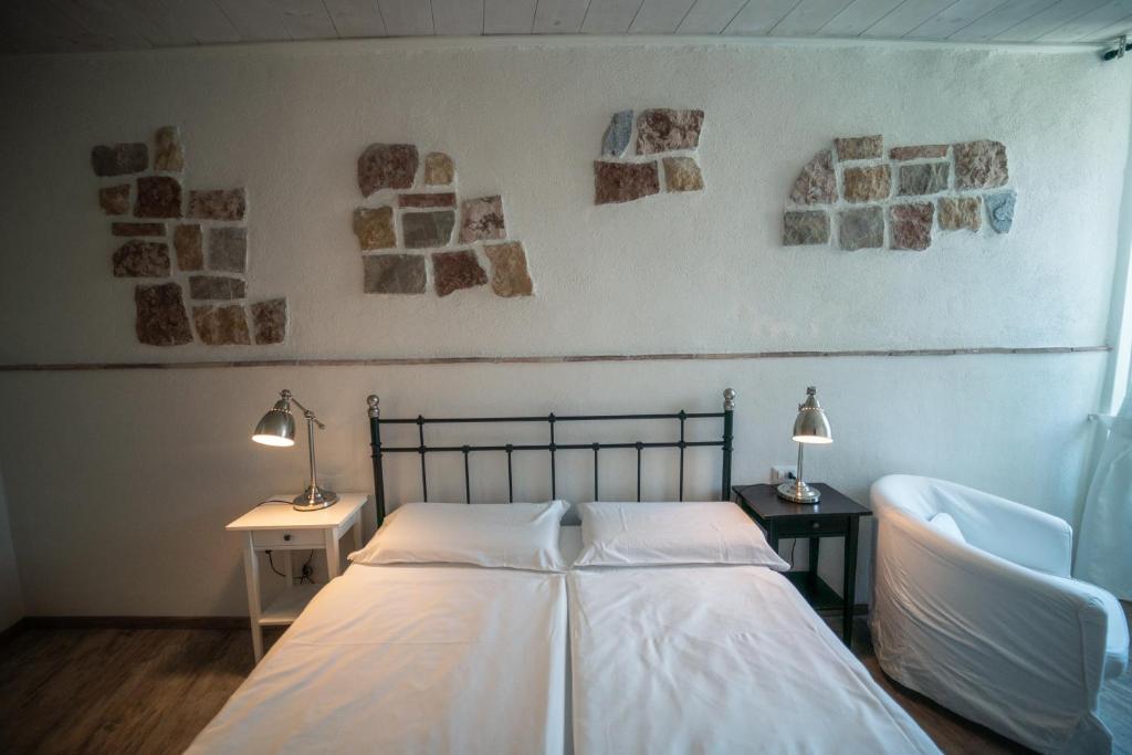 Een bed of bedden in een kamer bij Garni Gianmartin
