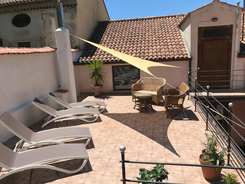 Patio nebo venkovní prostory v ubytování ReginElena B&B