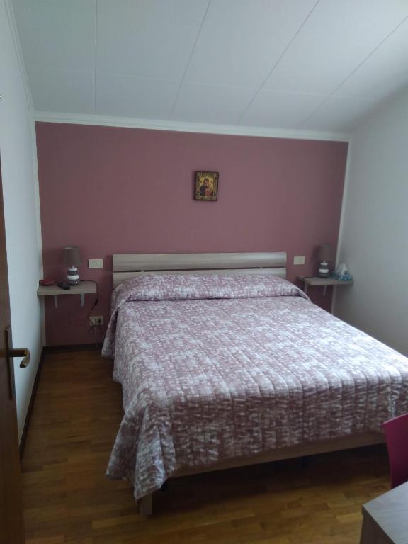 Postel nebo postele na pokoji v ubytování B&B NONO TILIO