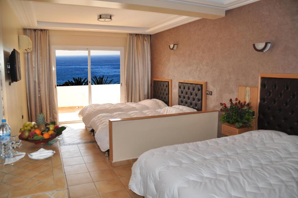 Postel nebo postele na pokoji v ubytování Hotel Club Almoggar Garden Beach