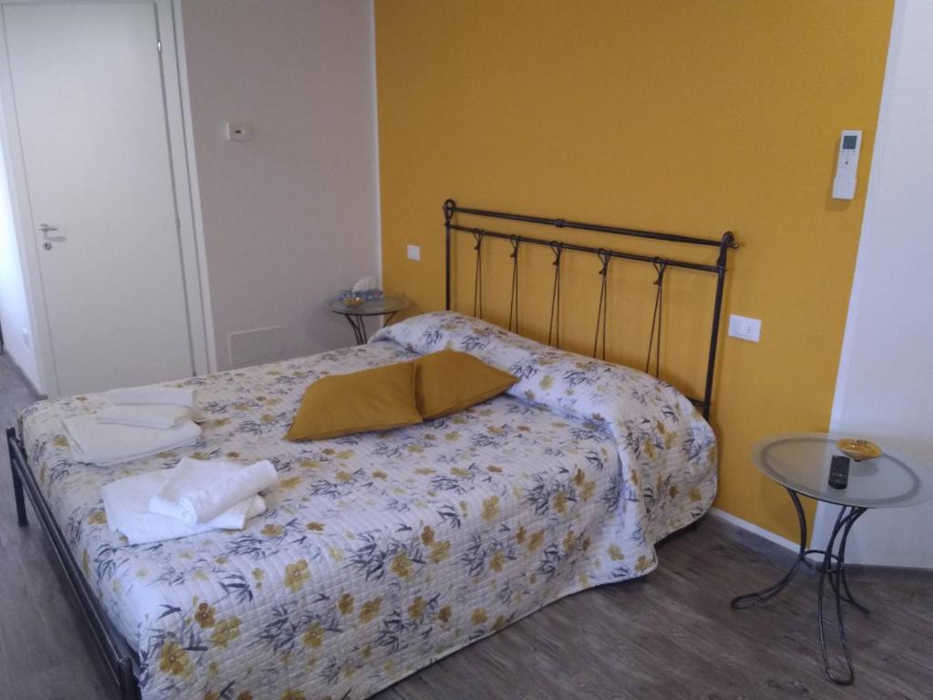 Postel nebo postele na pokoji v ubytování B&B NONO TILIO