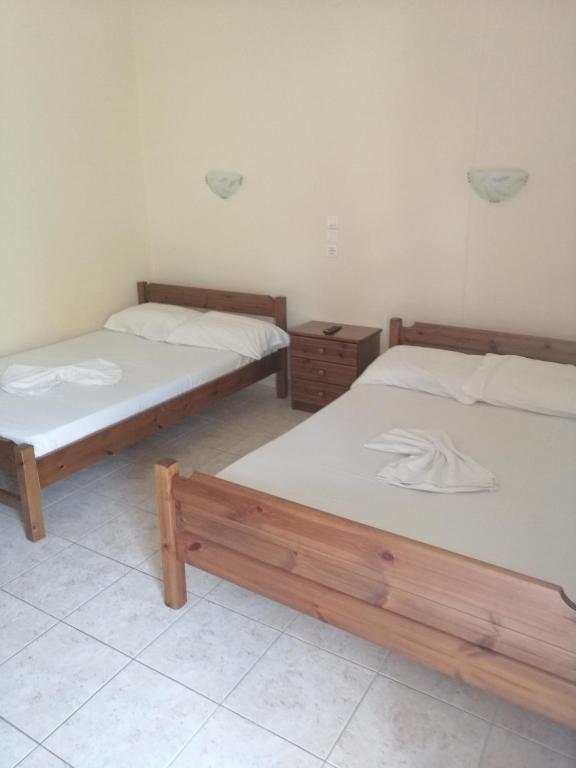 Łóżko lub łóżka w pokoju w obiekcie Apartments Christina