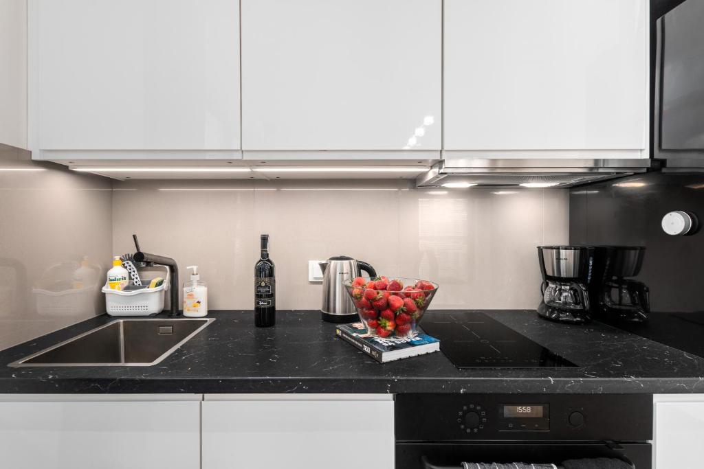 Kuchyňa alebo kuchynka v ubytovaní BG Apartments Grzybowska