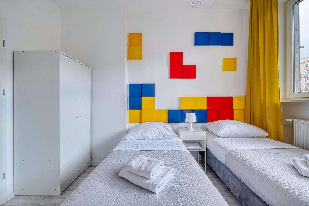 Postel nebo postele na pokoji v ubytování Level Rooms