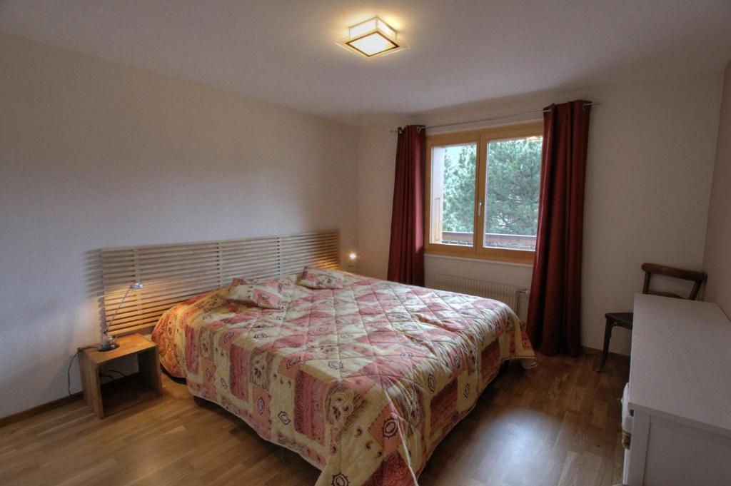 Appartement Ancien Comté 객실 침대