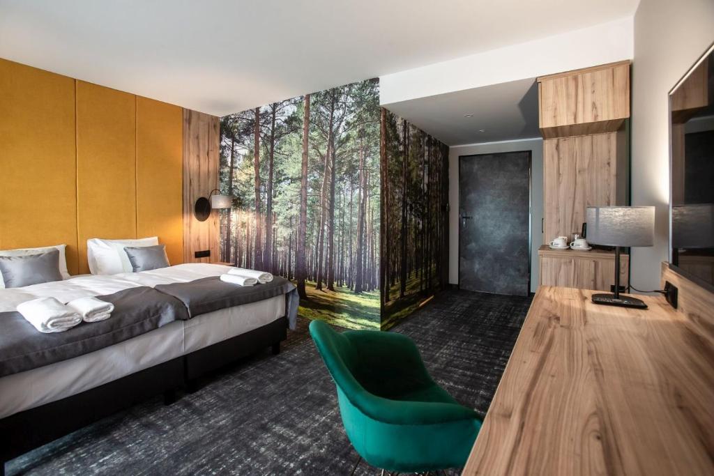 Posteľ alebo postele v izbe v ubytovaní OTTON-Charzykowy Bed&Restaurant