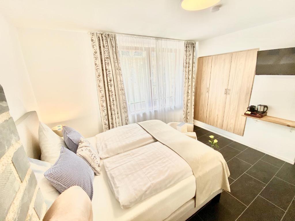 Postel nebo postele na pokoji v ubytování JUULS - Natur Hotel Garni