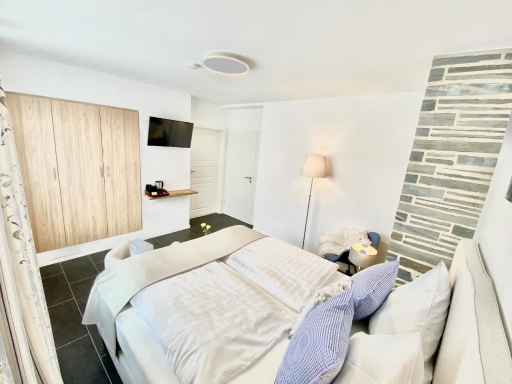 Postel nebo postele na pokoji v ubytování JUULS - Natur Hotel Garni