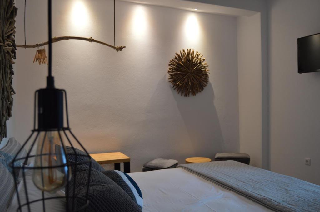 Posteľ alebo postele v izbe v ubytovaní Secret Garden Apartments