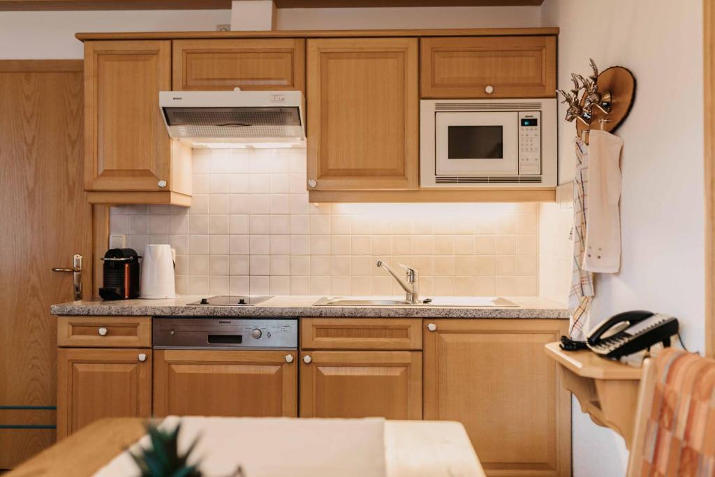 Kuchyň nebo kuchyňský kout v ubytování Landhaus Rohrmoser