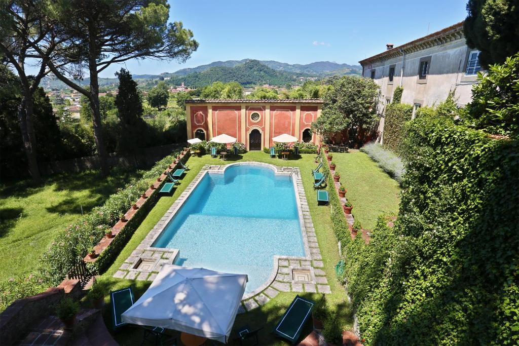 an overhead view of a swimming pool in a yard at Villa Luisa in Lucca