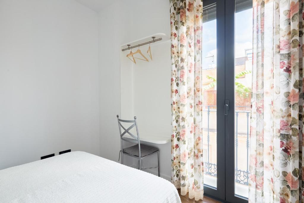 Postel nebo postele na pokoji v ubytování Veoapartment San Lorenzo