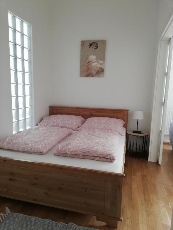 Posteľ alebo postele v izbe v ubytovaní GOLD 2 Apartman