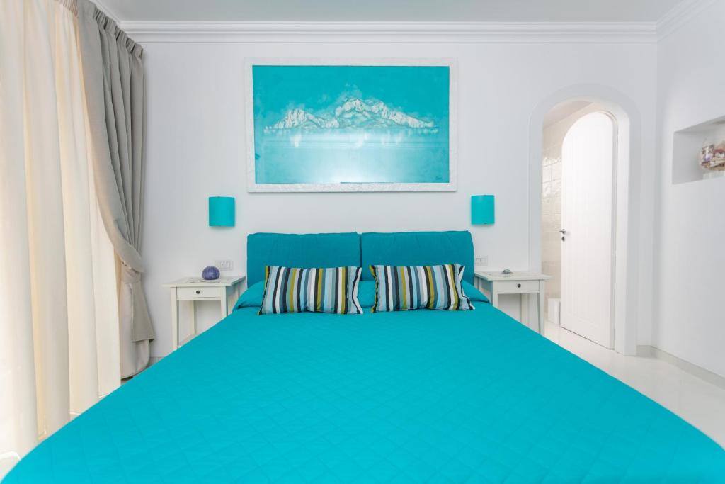 Een bed of bedden in een kamer bij Aldarogi