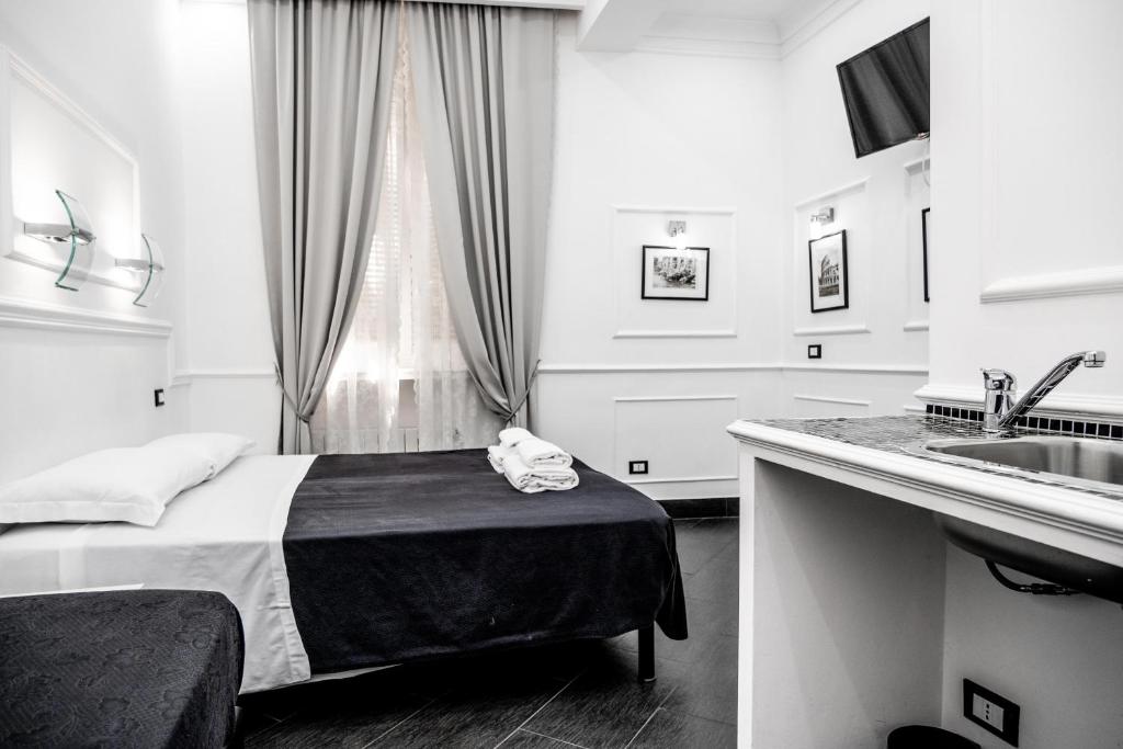 A bed or beds in a room at L'antica Locanda Dell'Orso