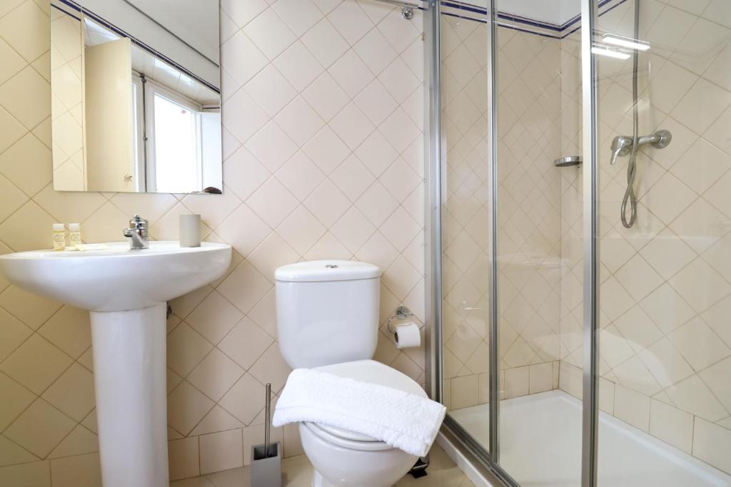 Koupelna v ubytování Dolce Vianna - City Centre Rooms
