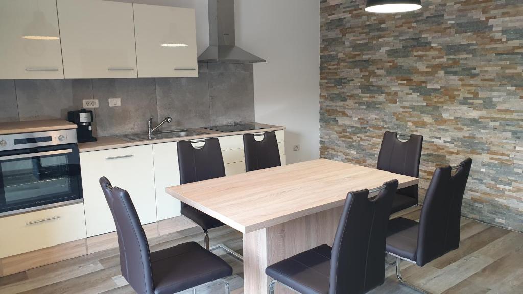 Kuchyň nebo kuchyňský kout v ubytování Apartma Claudia