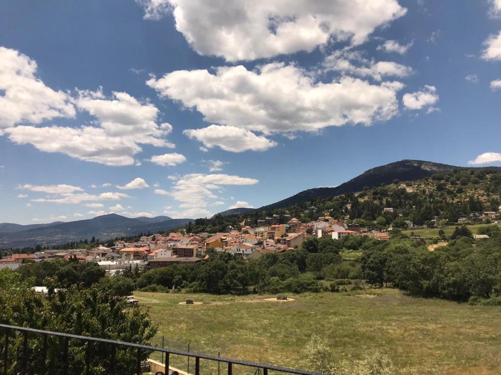 a view of a town from a hill at El Mirador de Cercedilla - Nueva Apertura in Cercedilla