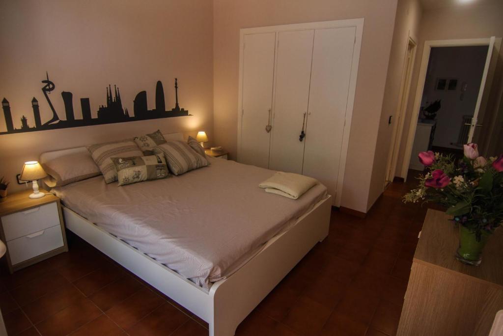 A bed or beds in a room at Musclera