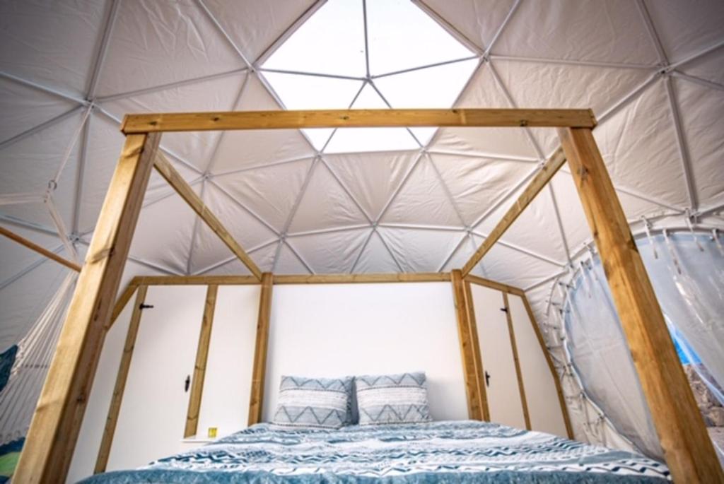 Cama o camas de una habitación en Blue Ocean Camp - Tasartico