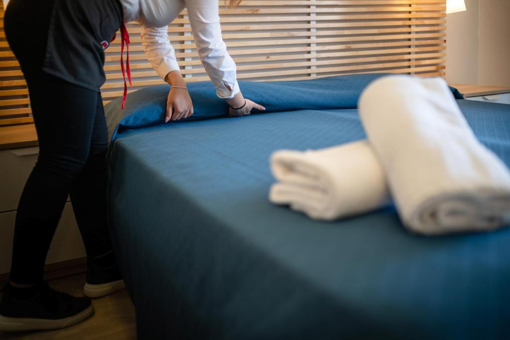 Postel nebo postele na pokoji v ubytování Hotel Firenze
