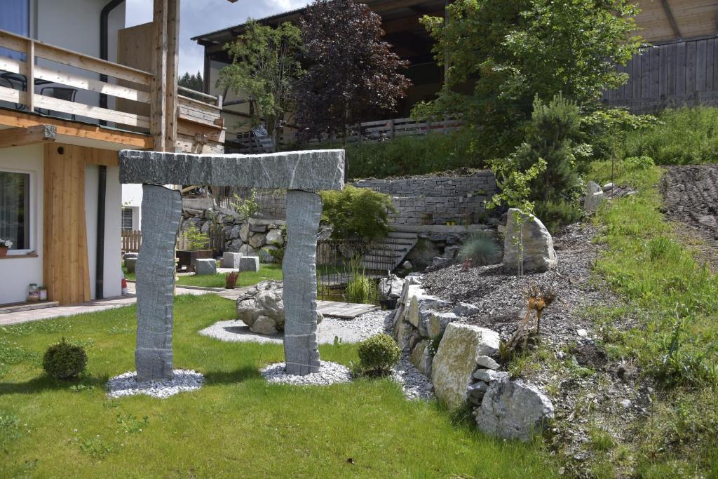 A garden outside Landhotel Anna