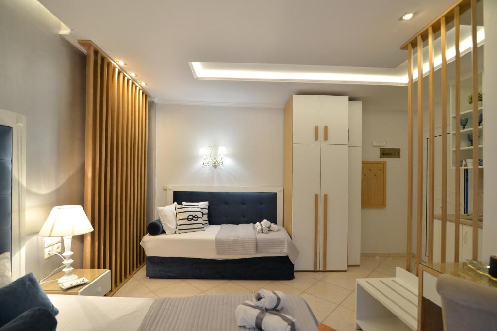 Posteľ alebo postele v izbe v ubytovaní Epavlis Luxury apts