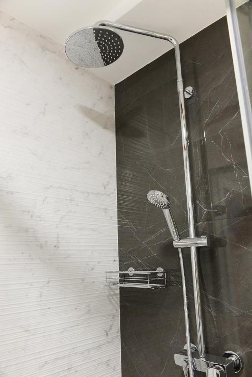 Koupelna v ubytování Veli Varos OLD TOWN Deluxe APARTMENT City Centre