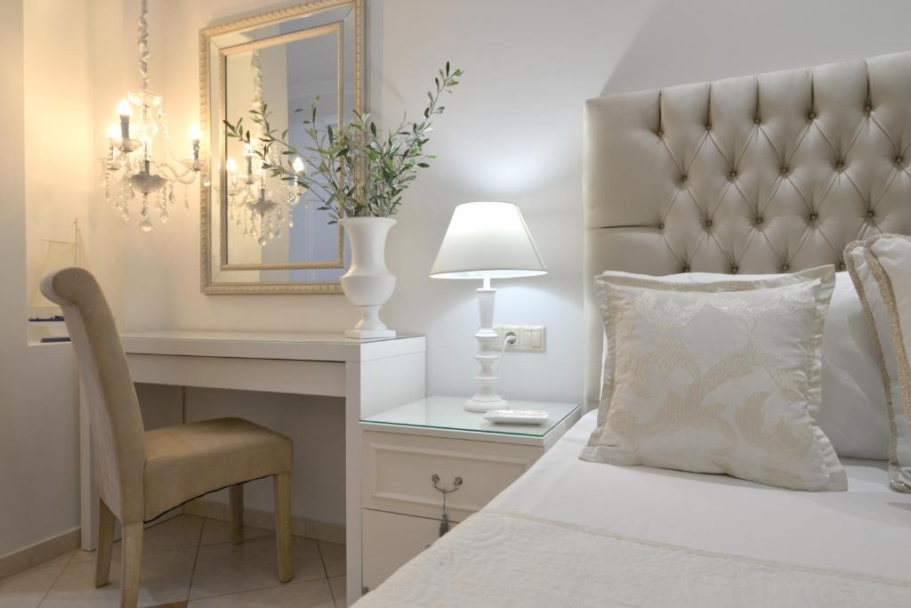 Posteľ alebo postele v izbe v ubytovaní Epavlis Luxury apts