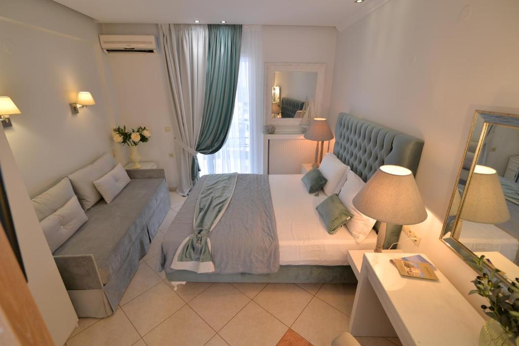 Posteľ alebo postele v izbe v ubytovaní Epavlis Luxury apts