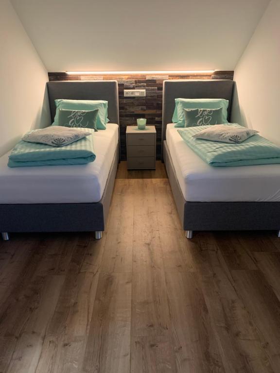 Postel nebo postele na pokoji v ubytování Ferienhaus Feil
