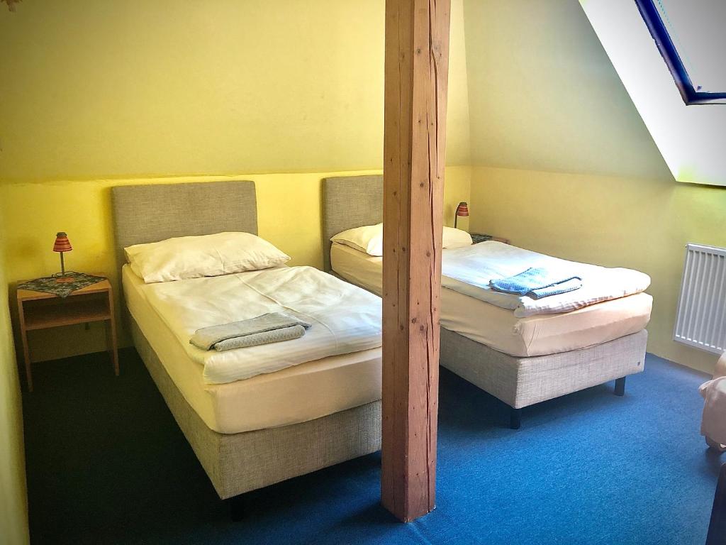 Postel nebo postele na pokoji v ubytování Hotel Classic