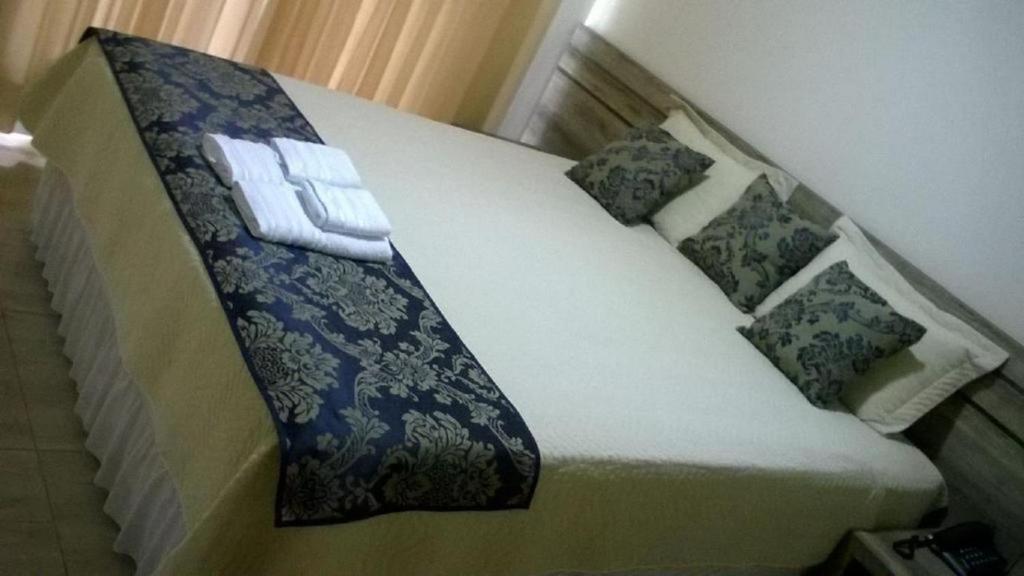 Postel nebo postele na pokoji v ubytování Open Hotel