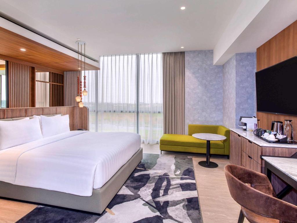 Letto o letti in una camera di Mercure Tangerang BSD City