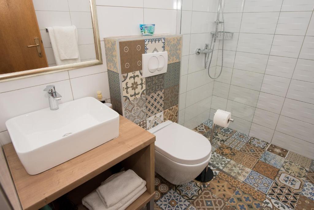 Ванная комната в Apartments Lovrić