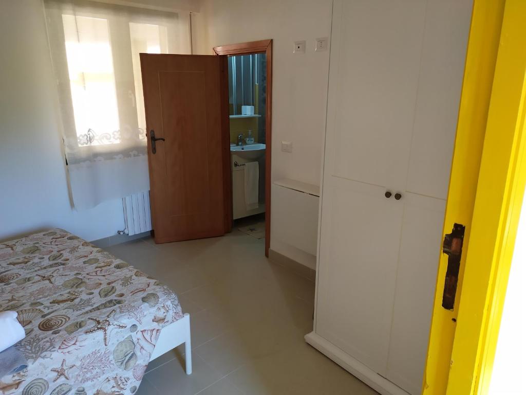 Postel nebo postele na pokoji v ubytování Lo Spicchio b&b
