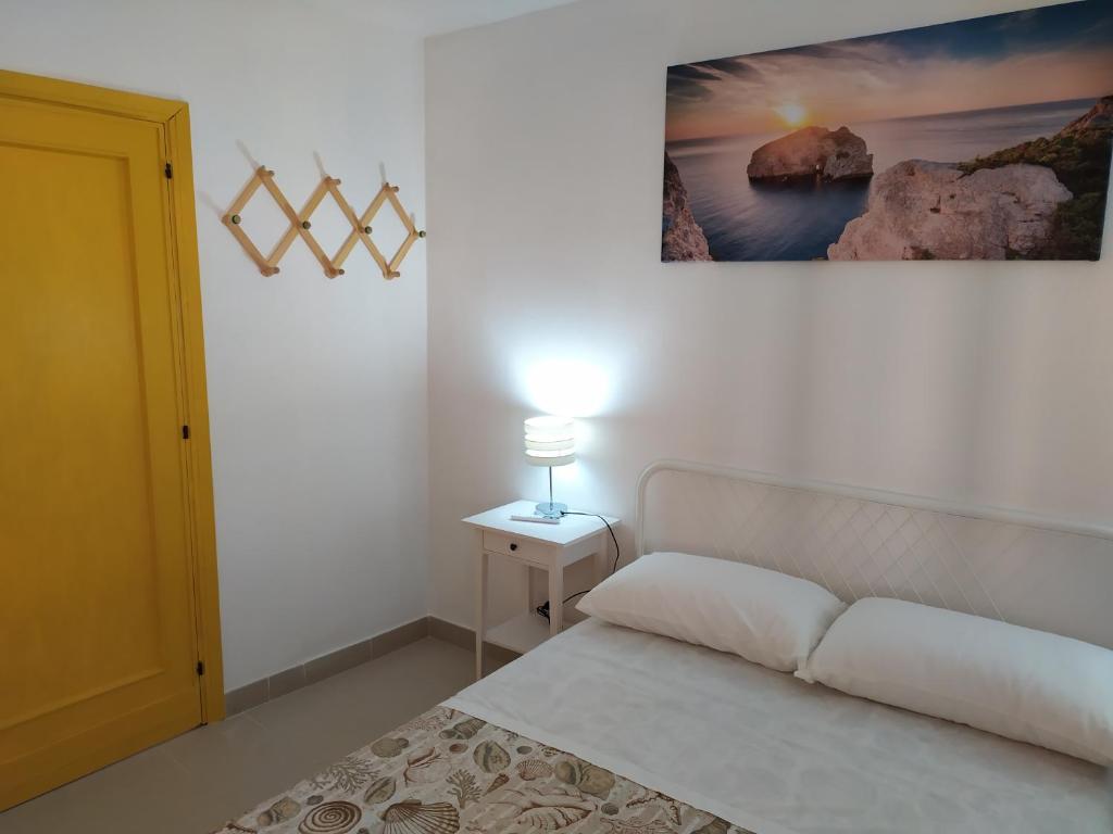 Postel nebo postele na pokoji v ubytování Lo Spicchio b&b