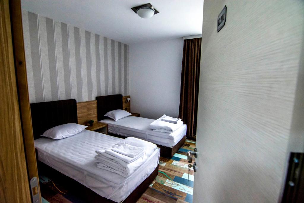 Postel nebo postele na pokoji v ubytování Veykata Resort & Spa