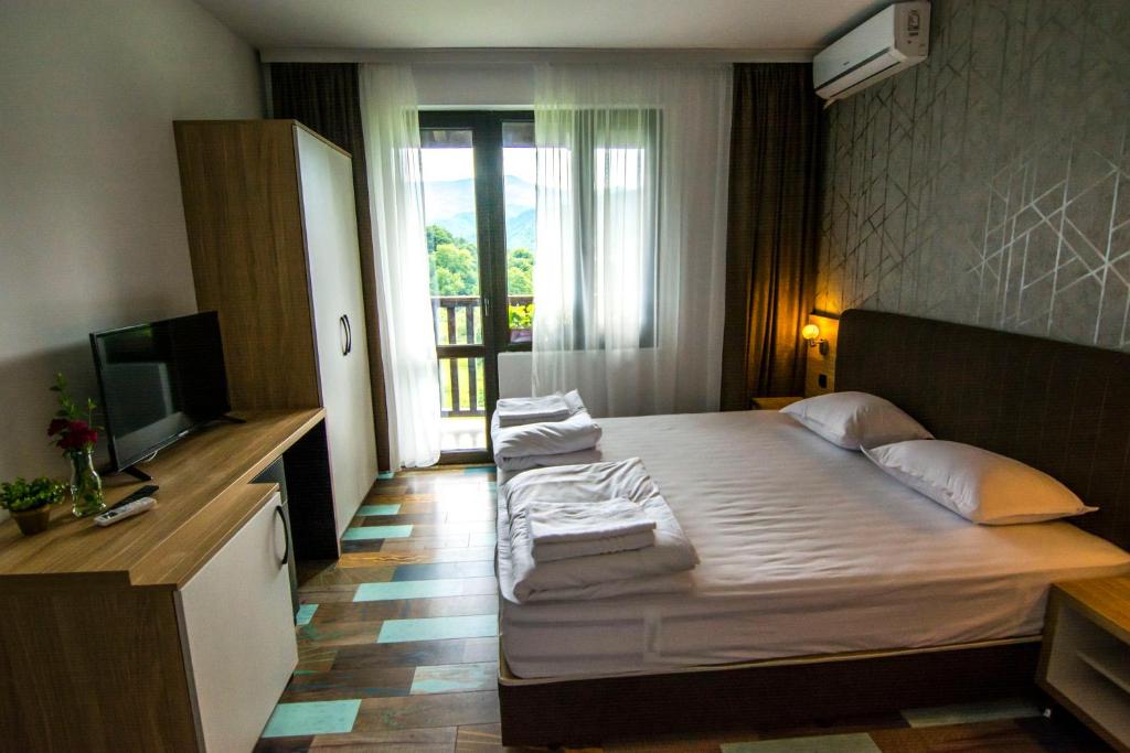 Postel nebo postele na pokoji v ubytování Veykata Resort & Spa