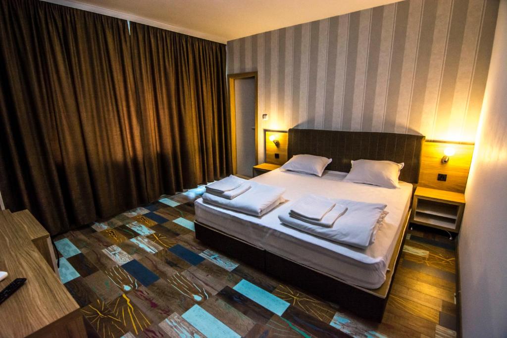 Postel nebo postele na pokoji v ubytování Veykata Resort & Spa