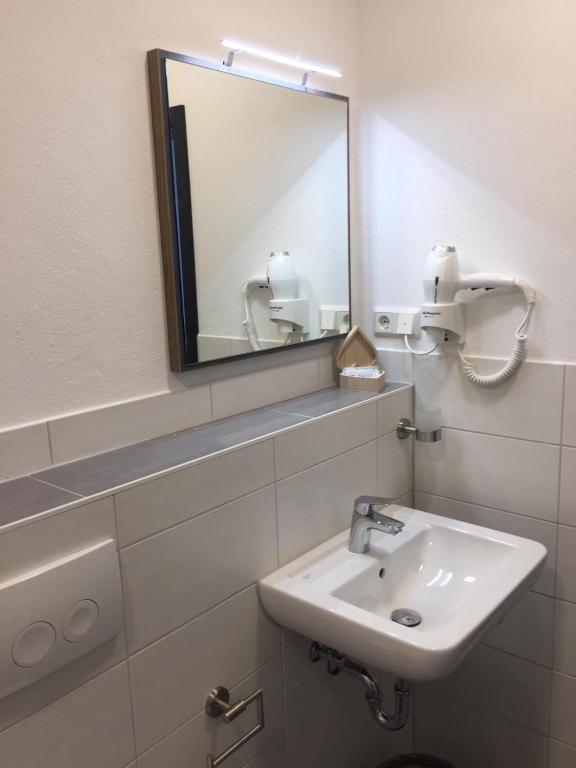 Koupelna v ubytování Hotel am Kunnerstein