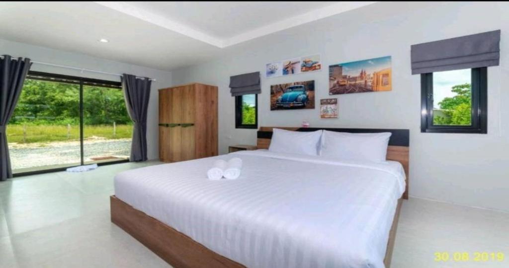 Postel nebo postele na pokoji v ubytování Malinee Resort