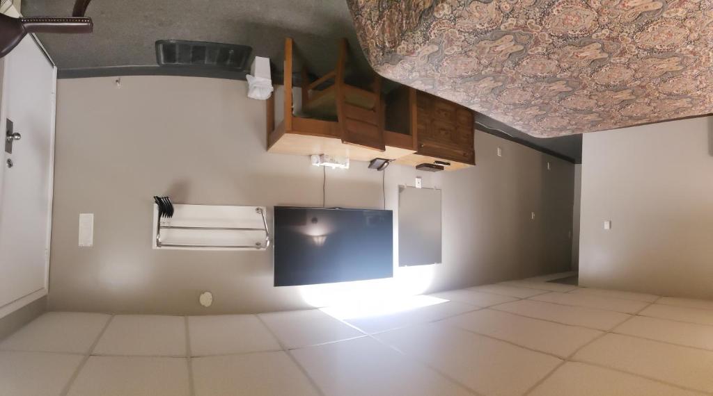 Kuchyň nebo kuchyňský kout v ubytování Sunset Motel