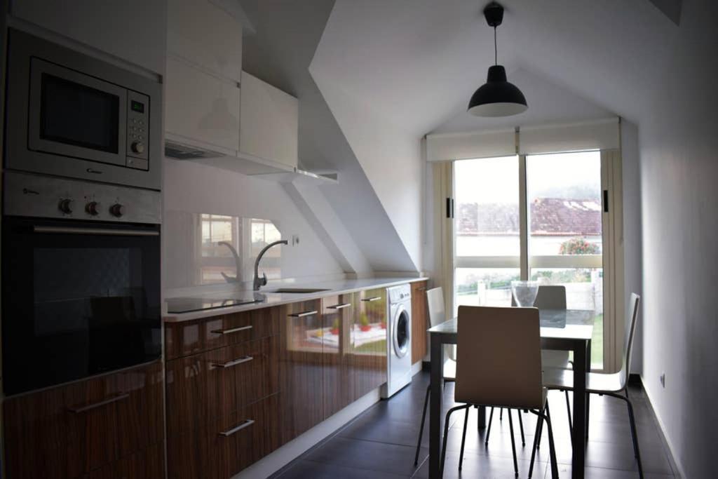 Kuchyň nebo kuchyňský kout v ubytování Apartamento Aldara a escasos metros de la playa