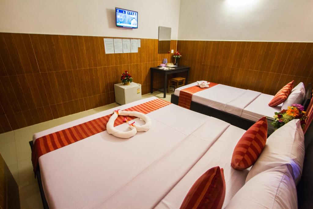 Postel nebo postele na pokoji v ubytování Botoum Hotel