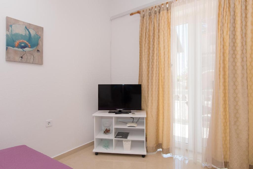 Телевизор и/или развлекательный центр в Apartments Lovrić