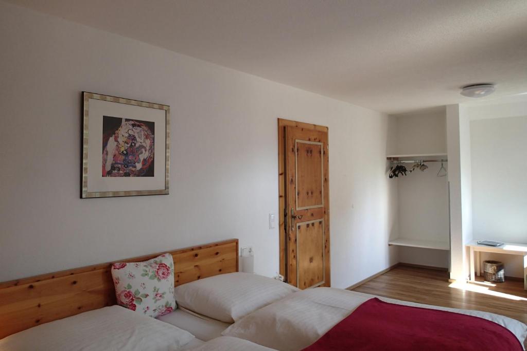 Postel nebo postele na pokoji v ubytování Gästehaus Rosa Leitgeb
