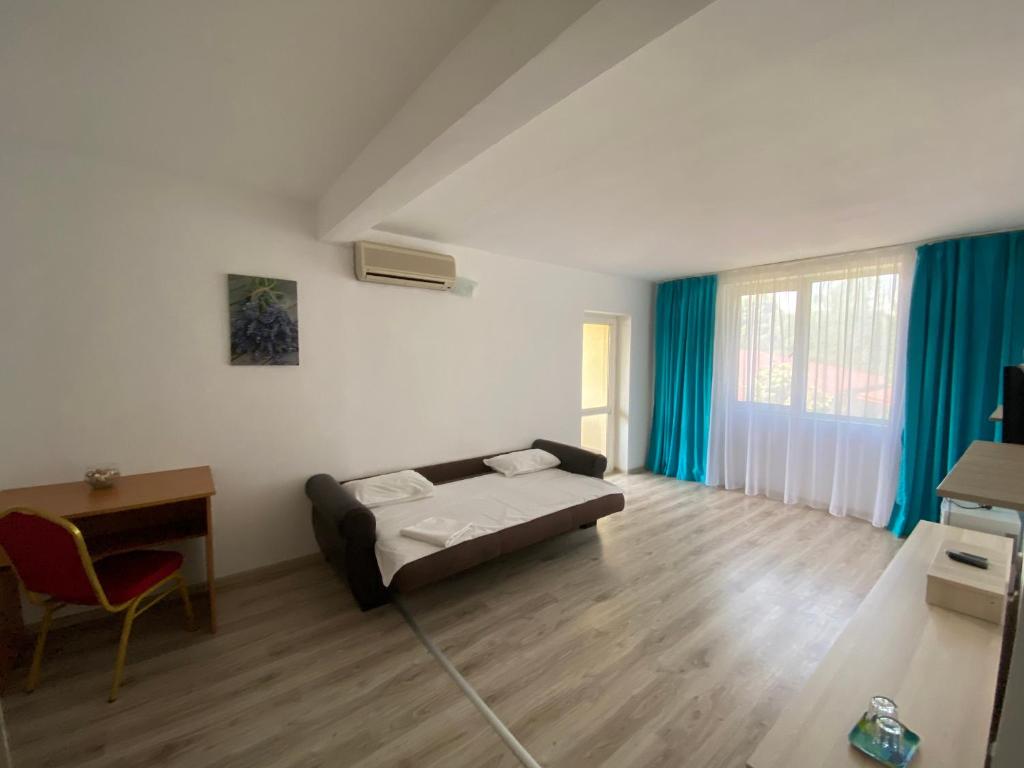 Postel nebo postele na pokoji v ubytování Q Hotel