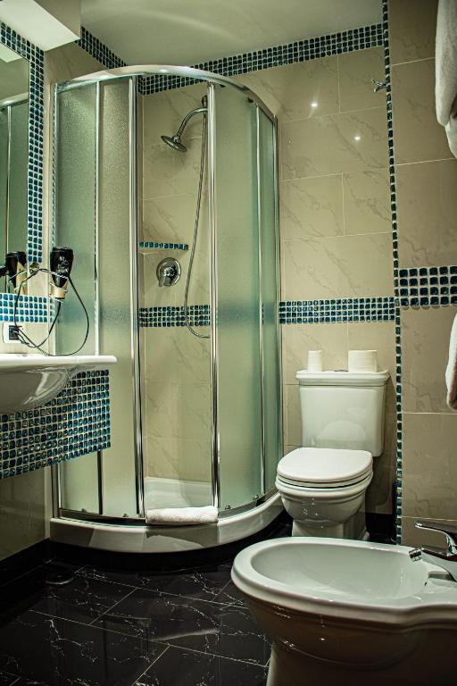 Um banheiro em Hotel Canova