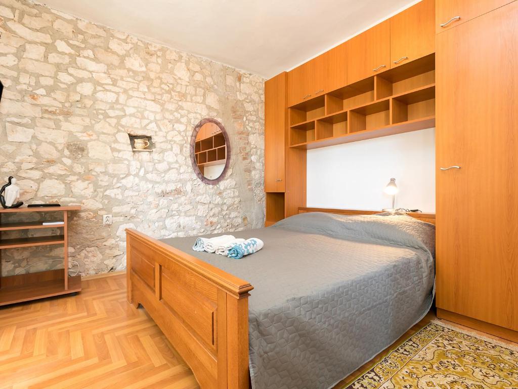 Postel nebo postele na pokoji v ubytování Apartman Šušnjić